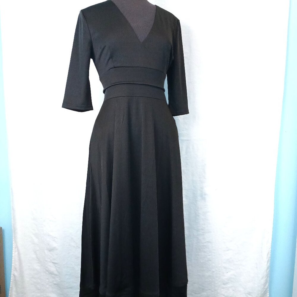 Classic Black Dress with Clean Lines and Stitching Detail